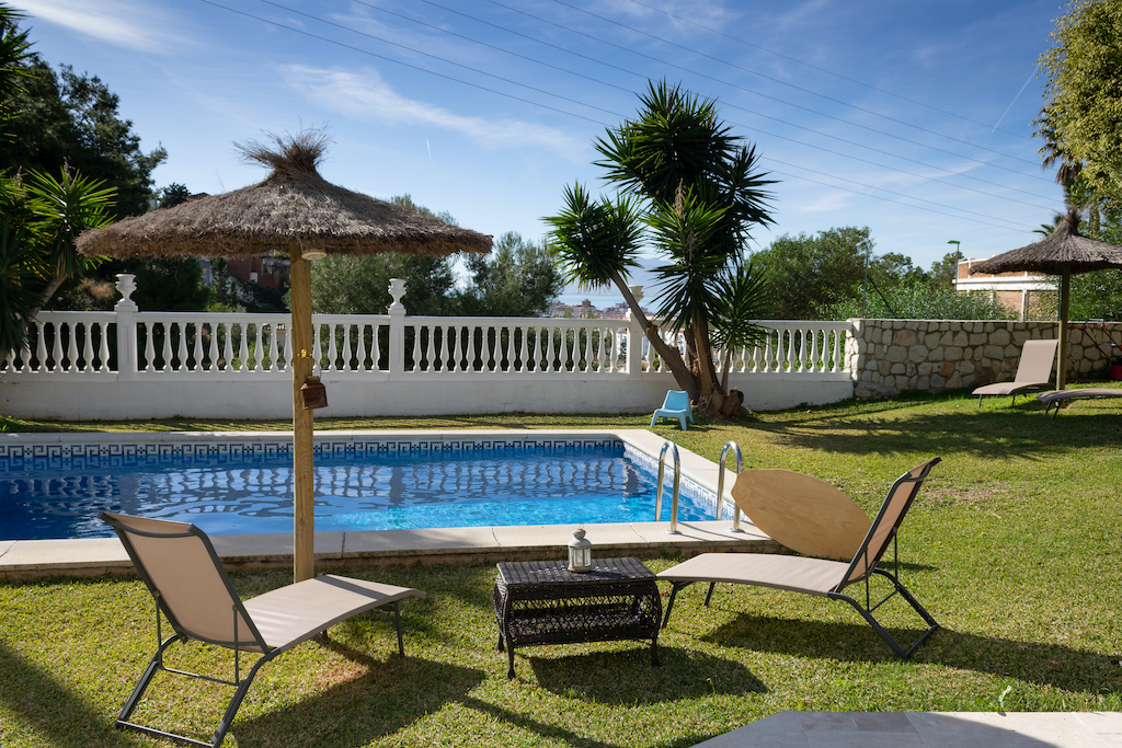 views of the pool and garden of Villa Maria