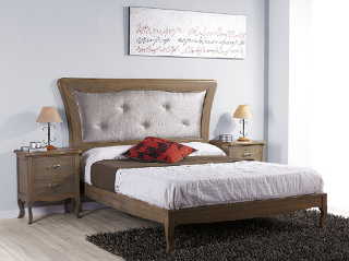 Dormitorio con cabecero tapizado