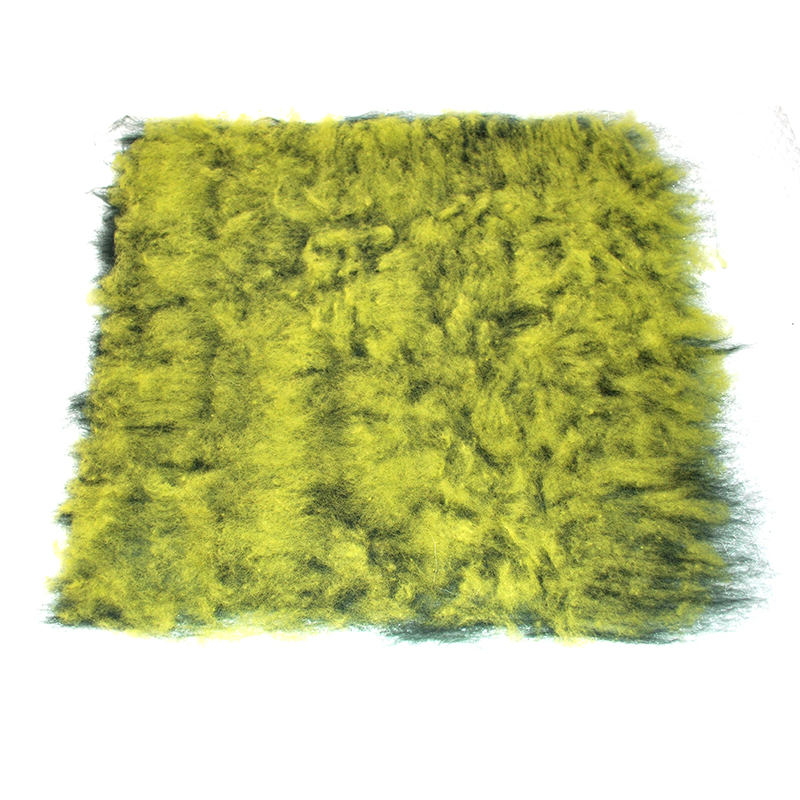 3- Segunda capa de lana, en sentido contrario a la anterior.